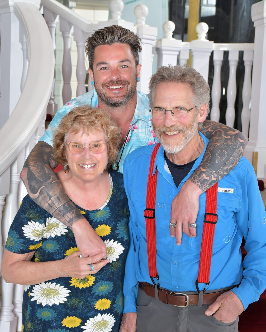 Family of three on the grand staircase