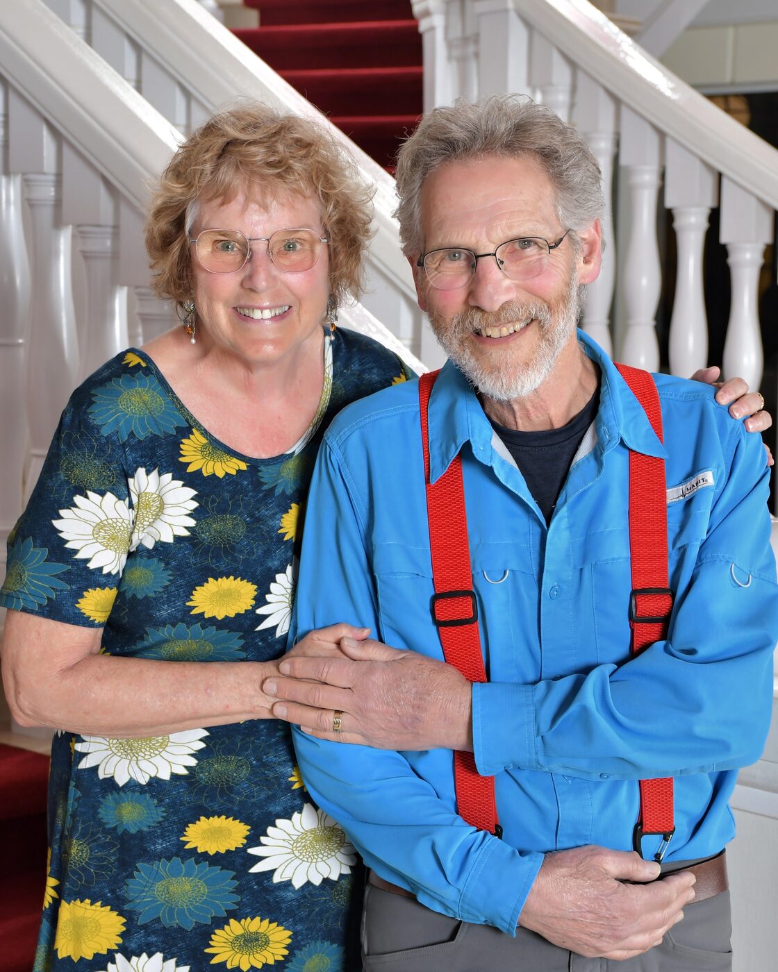 Couple on the grand staircase, formal portrait